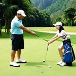 **Image Prompt:** A golf coach (male or female) in Malaysia giving a one-on-one field lesson to a smiling student on a lush green golf course, focusing on swing technique. The coach is demonstrating a proper grip or stance. Bright sunny day.